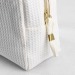 Trousse en nid d'abeille, trousse de toilette Werbung