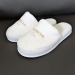 Chaussons de luxe en velours éponge avec logo brodé Geschäftsgeschenk