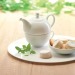 Set aus Teekanne und Tasse, Teekanne Werbung
